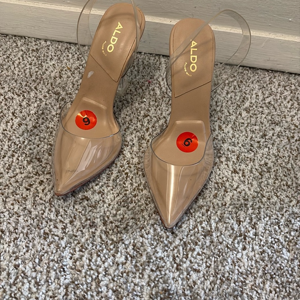 Aldo clear sling back with clear heels. Very nice shoe worn once for wedding.